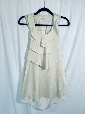 BLVD Cream Layered Ruffle Sleeveless Top With open back